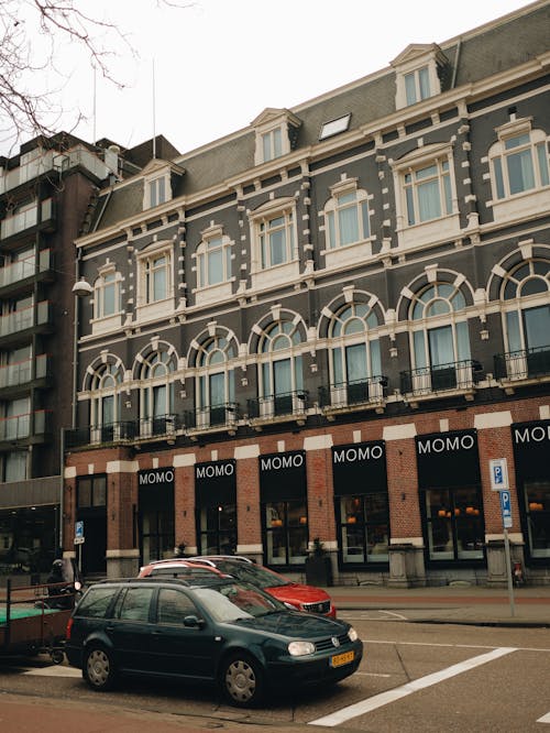 A building with cars parked in front of it