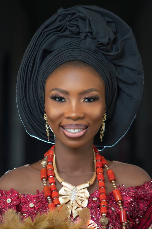 A beautiful african woman wearing a traditional headdress