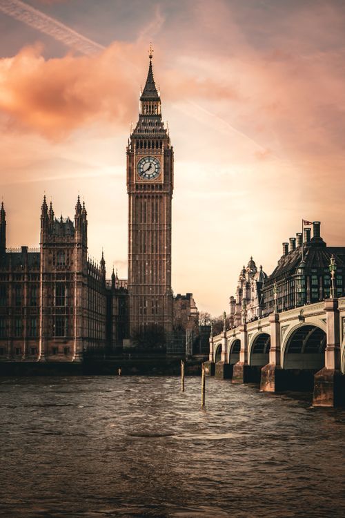 Free Beautiful view of Big Ben and Westminster Bridge over Thames River at sunset in London, UK. Stock Photo