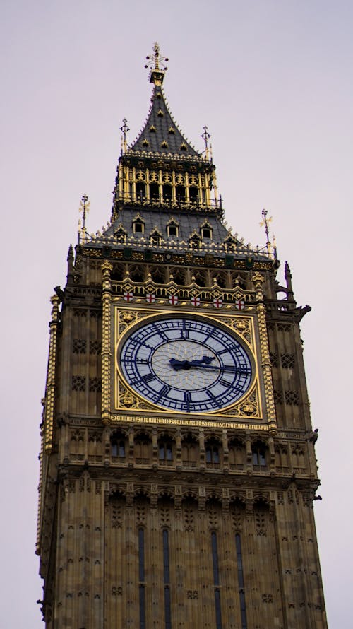 A tall clock tower with a large clock on it