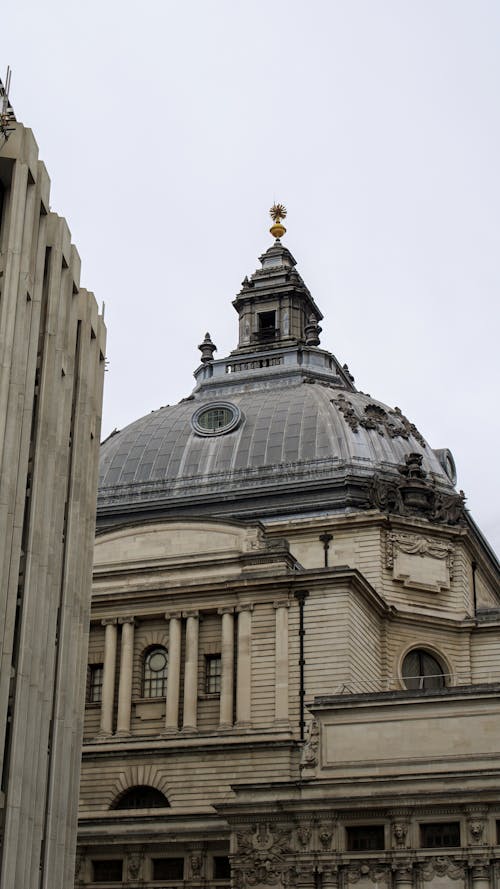 A large building with a dome and a clock