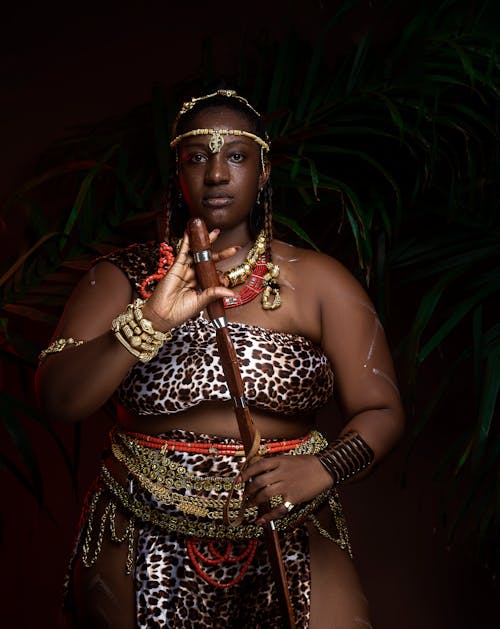 Woman in African Leopard Skin Dress and Jewelry