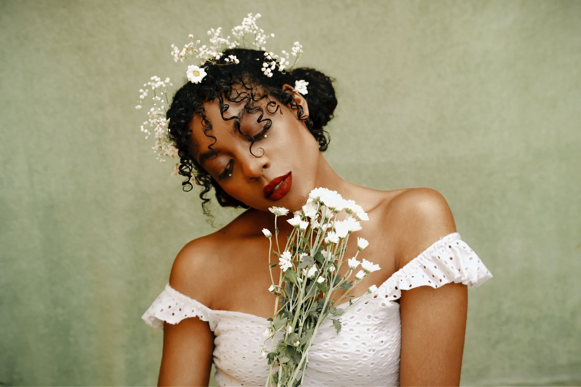 Portrait of Bride with Bouquet of Flowers