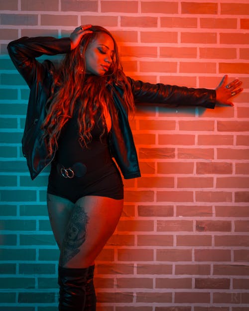 Woman in Leather Jacket in Red Light