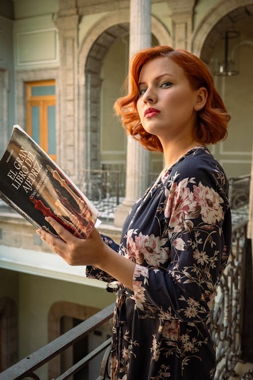 Portrait of Redhead Woman with Book