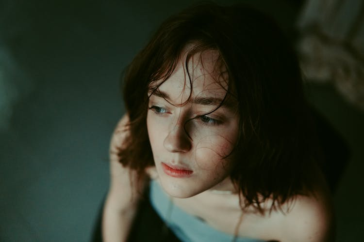 Portrait Of Brunette Woman In A Studio 