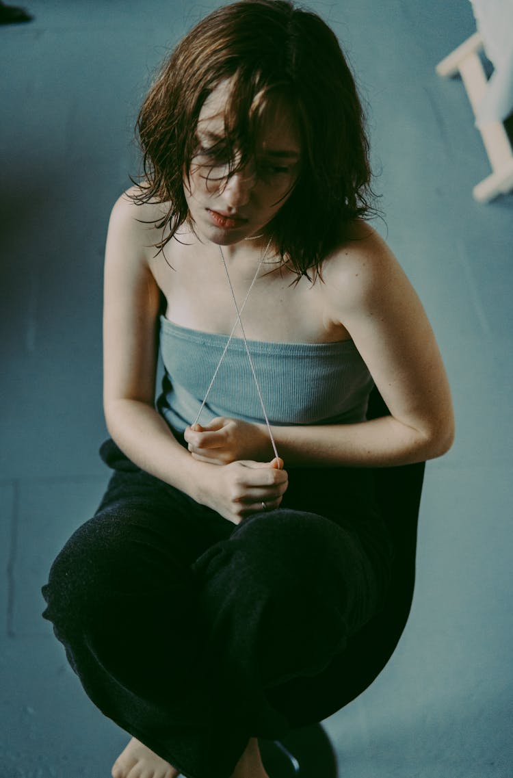 Portrait Of Brunette Woman In A Studio 