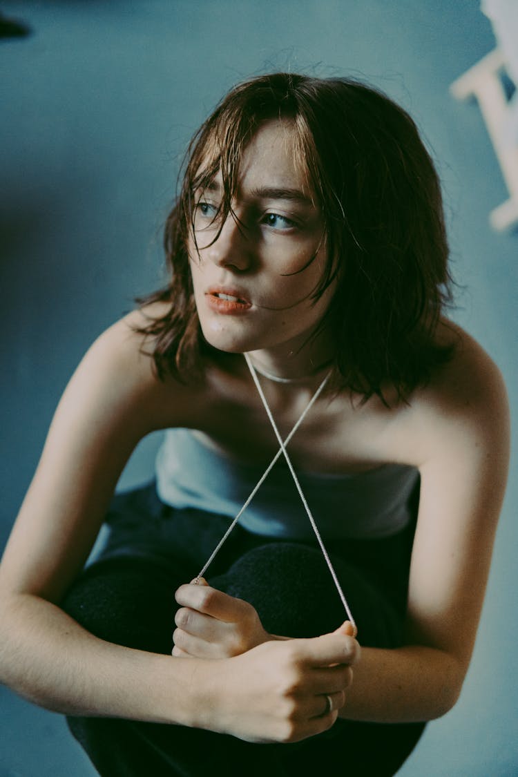 Portrait Of Brunette Woman In A Studio 