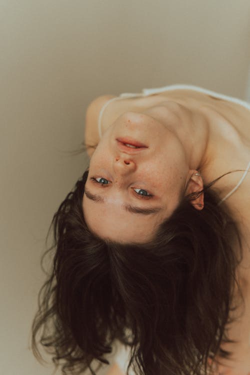 A woman is upside down in a photo