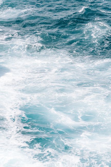 A captivating view of ocean waves creating stunning foam patterns off Torndirrup, Australia.