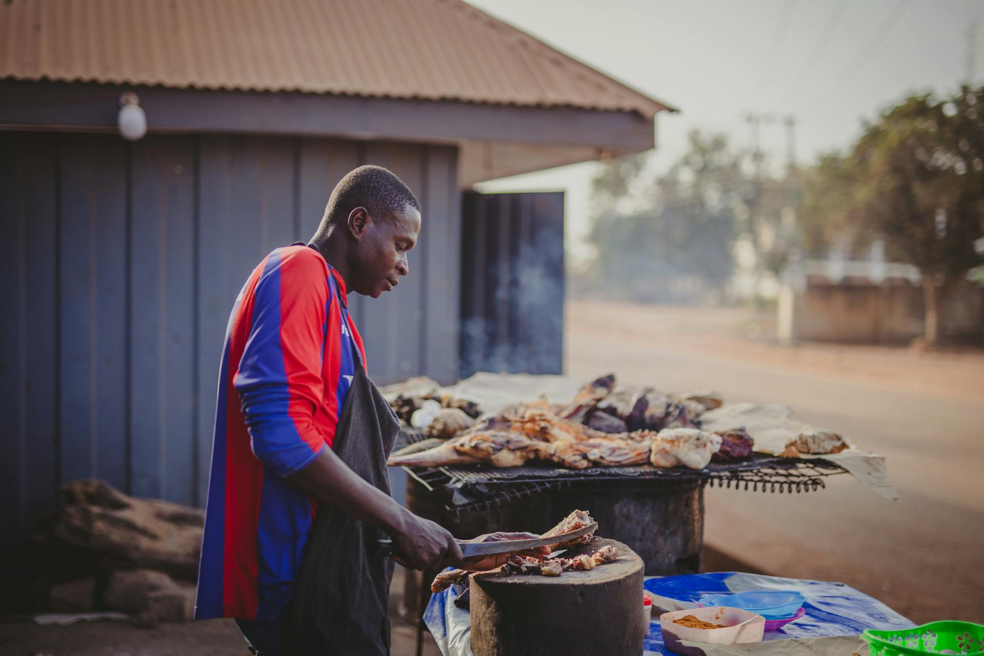 Butcher on Street in Village