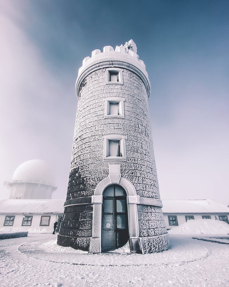 Lighthouse In A Peak In Portugal 