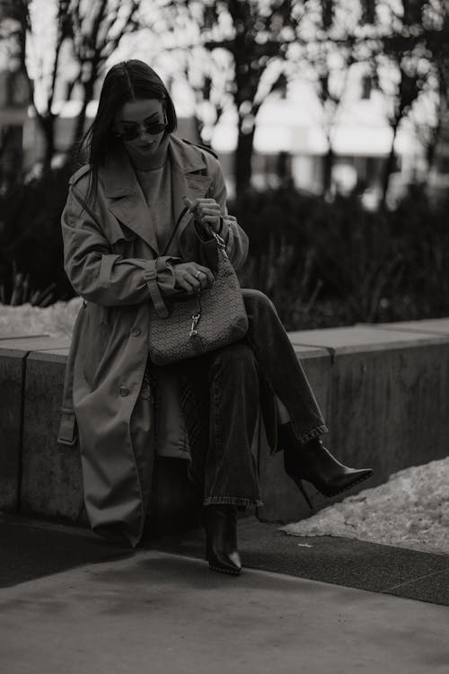 Woman Wearing Trench Coat in a Park in Black and White