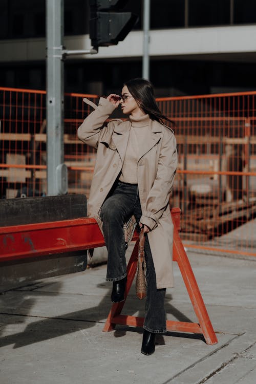 Young Fashionable Woman Posing in City 