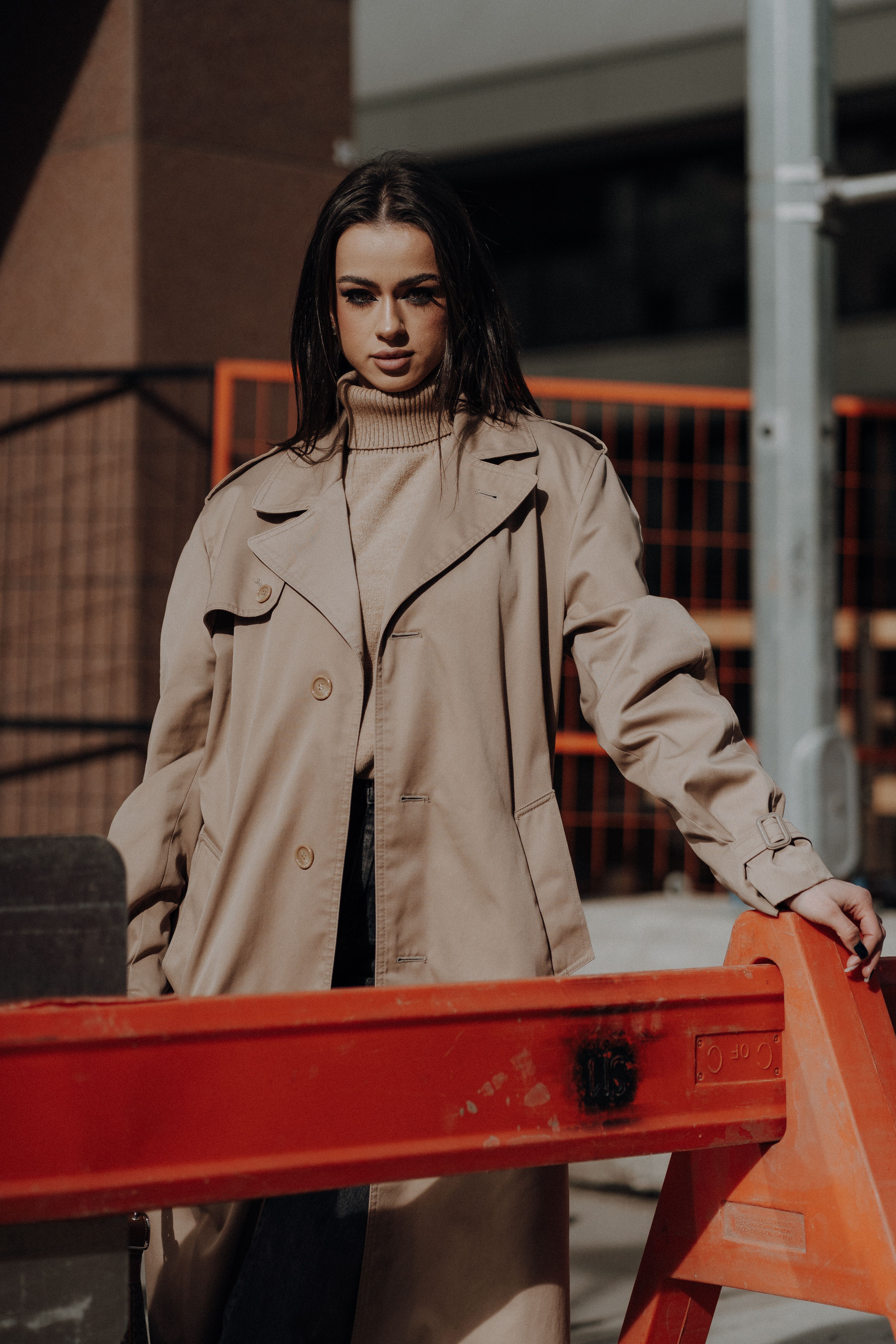 Young Brunette Woman in Black PVC Matrix Style Trench Coat Posing at a ...