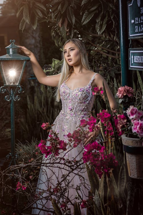 Blonde Woman Standing in Dress