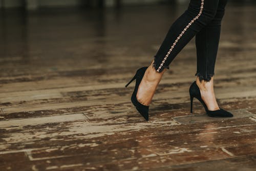Free Woman Wearing Black Suede Stilettos Stock Photo