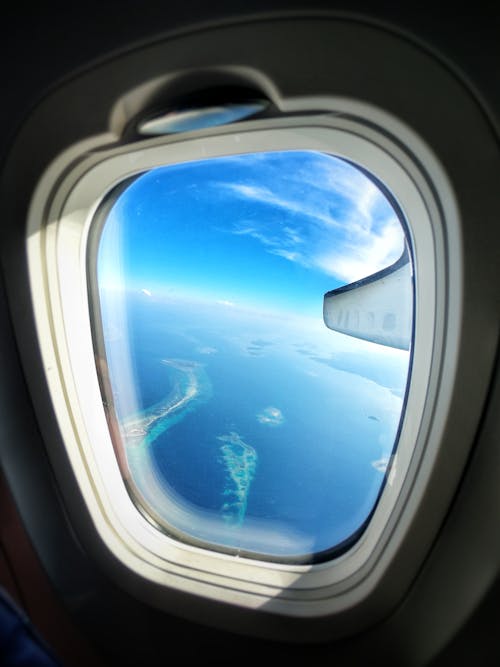 Free stock photo of aerial view, airplane, airplane window