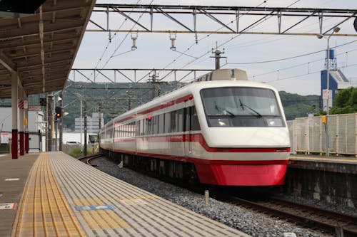 View of a Train Approaching the Station in a Japanese City 