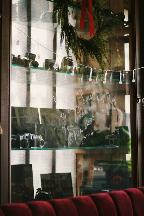 A christmas wreath on a window sill