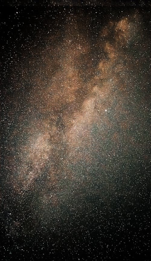 View of a Nebula and Stars on a Night Sky 
