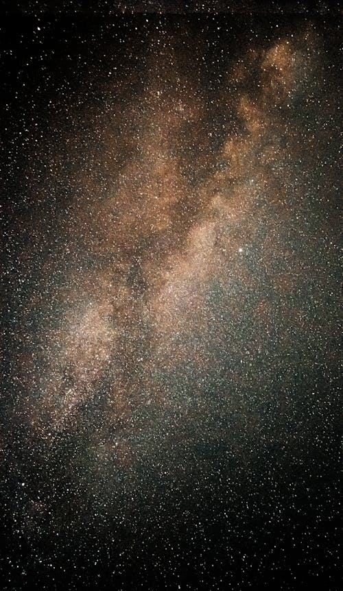 Free View of a Nebula and Stars on a Night Sky  Stock Photo