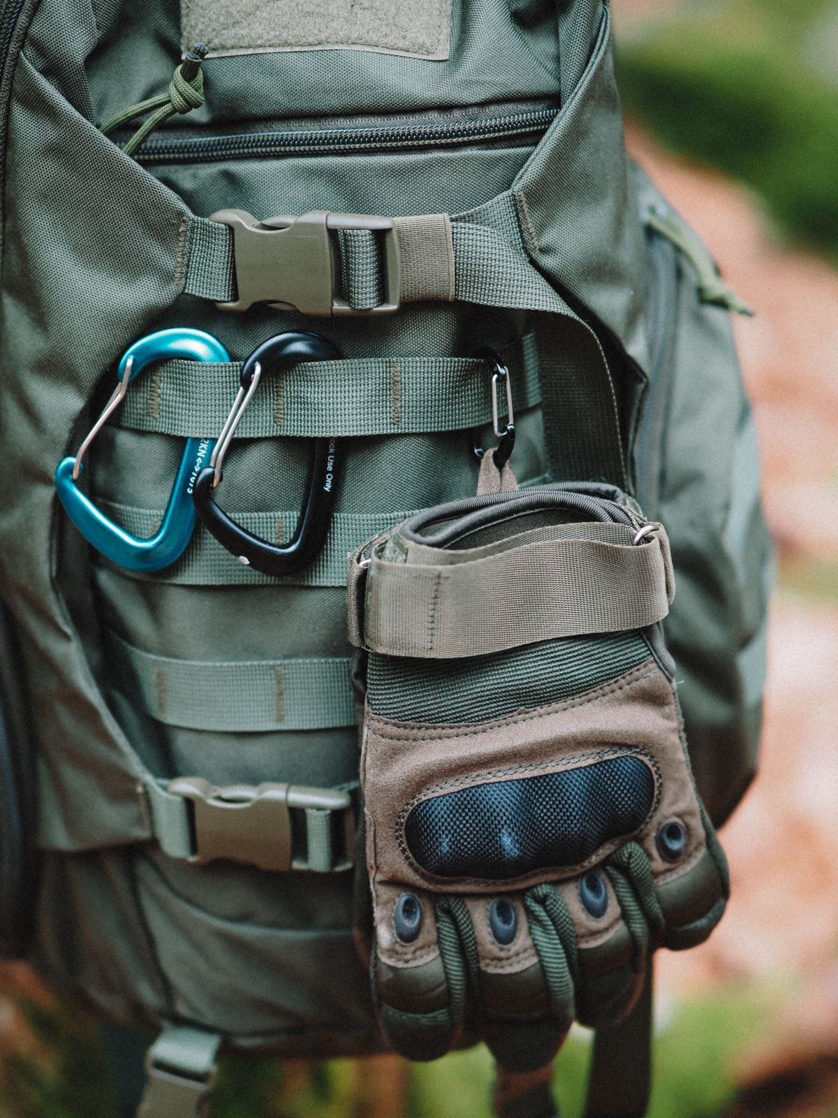 Tactical backpack for outdoor adventures with MOLLE webbing