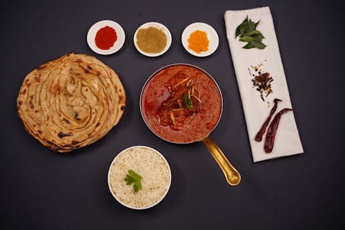 Безкоштовне стокове фото на тему «naan, tikka masala, вечеря»