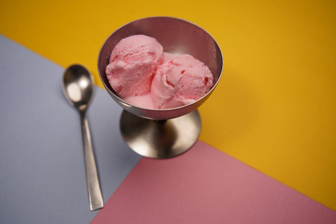 Pink Ice Cream Scoops in a Metal Bowl