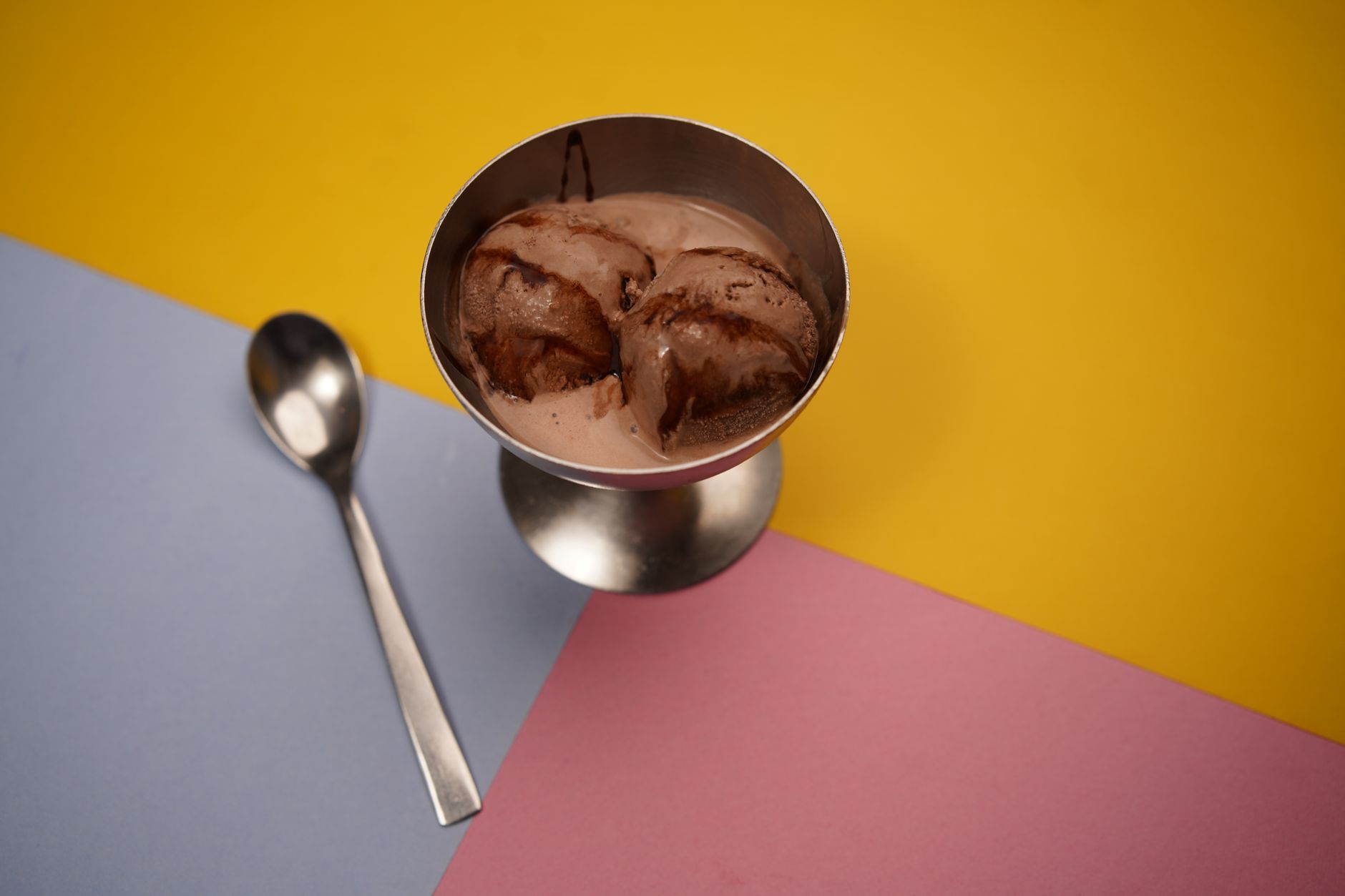 Whipped cream folding into chocolate base for ice cream