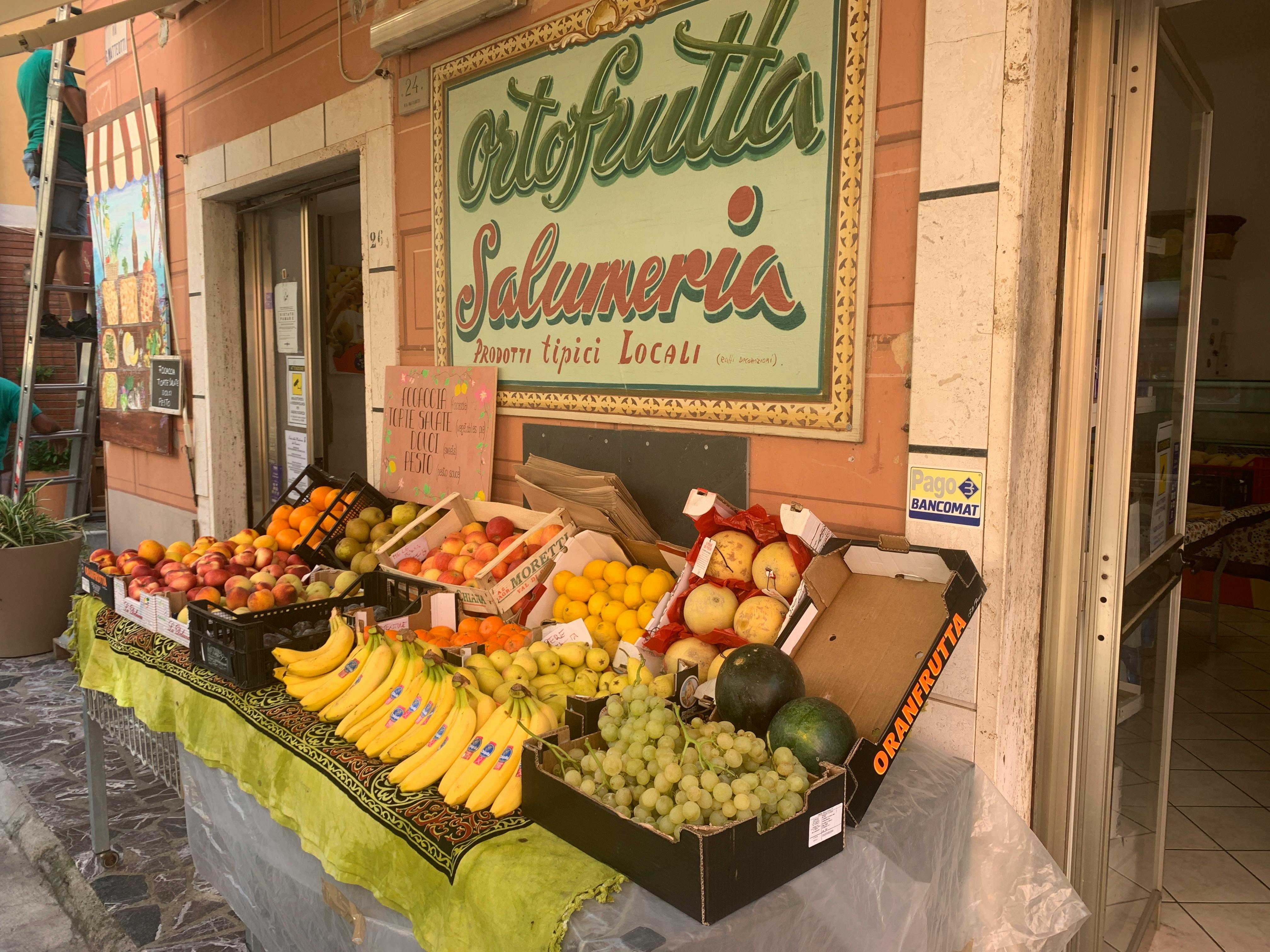 colorful fruit and vegetable assortment with running shoes, fresh market