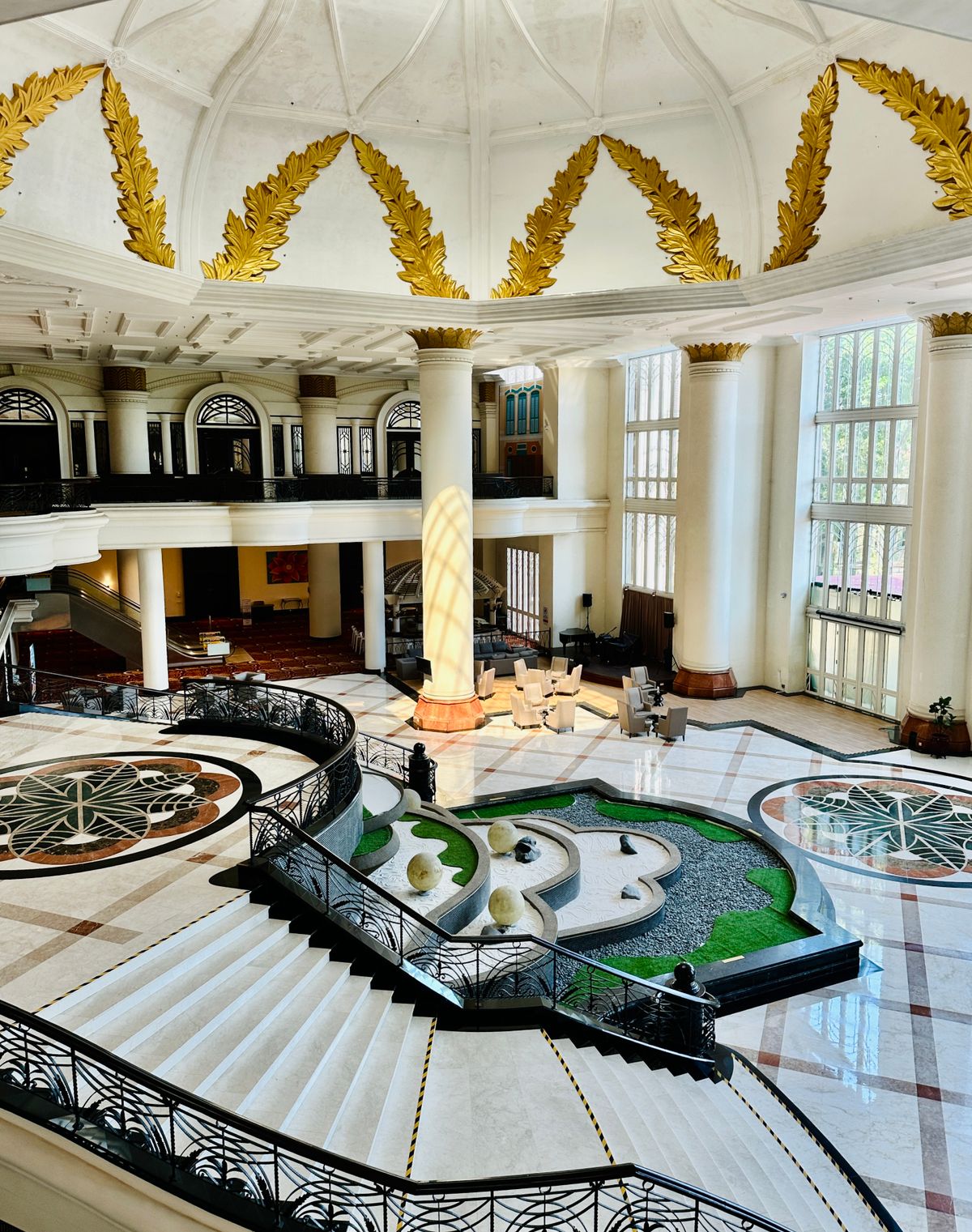 Luxury hotel interior with grand staircase