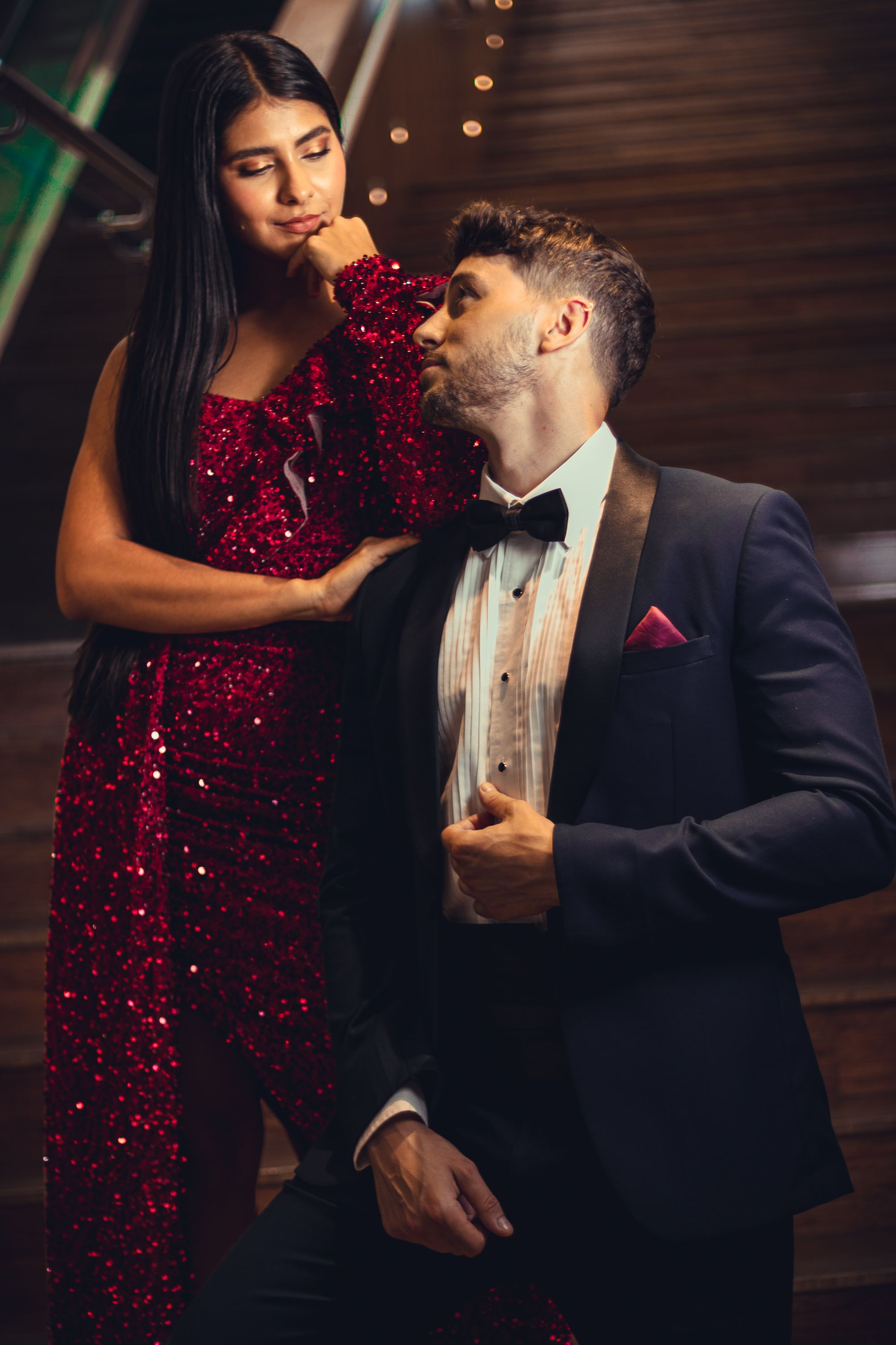 Brunette Woman in Red Dress Standing with Man in Suit · Free Stock Photo