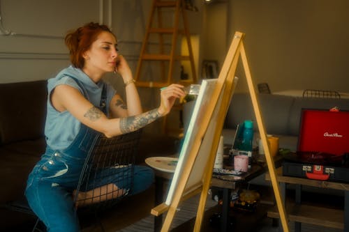 Redhead Painting A Picture