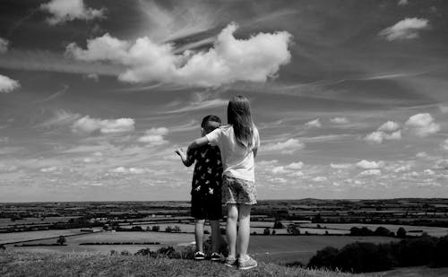 Two Kids Looking to the View in Black and White