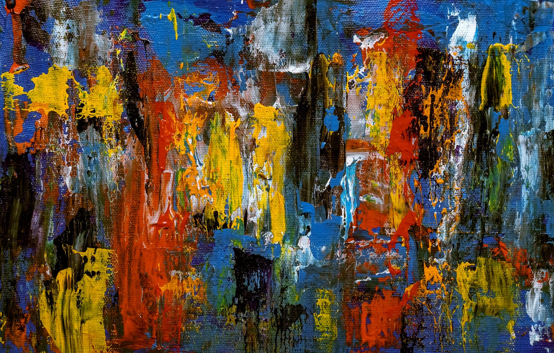 A colorful abstract expressionist painting using acrylics on canvas, showcasing vivid textures and dynamic colors.