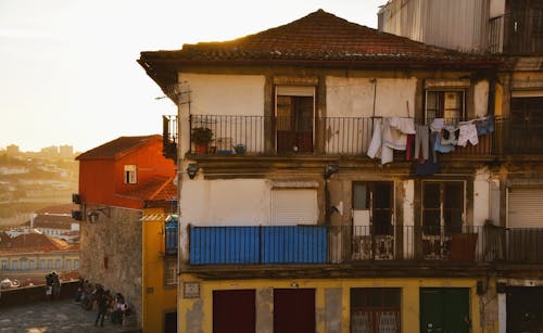 A building with clothes hanging on the balcony