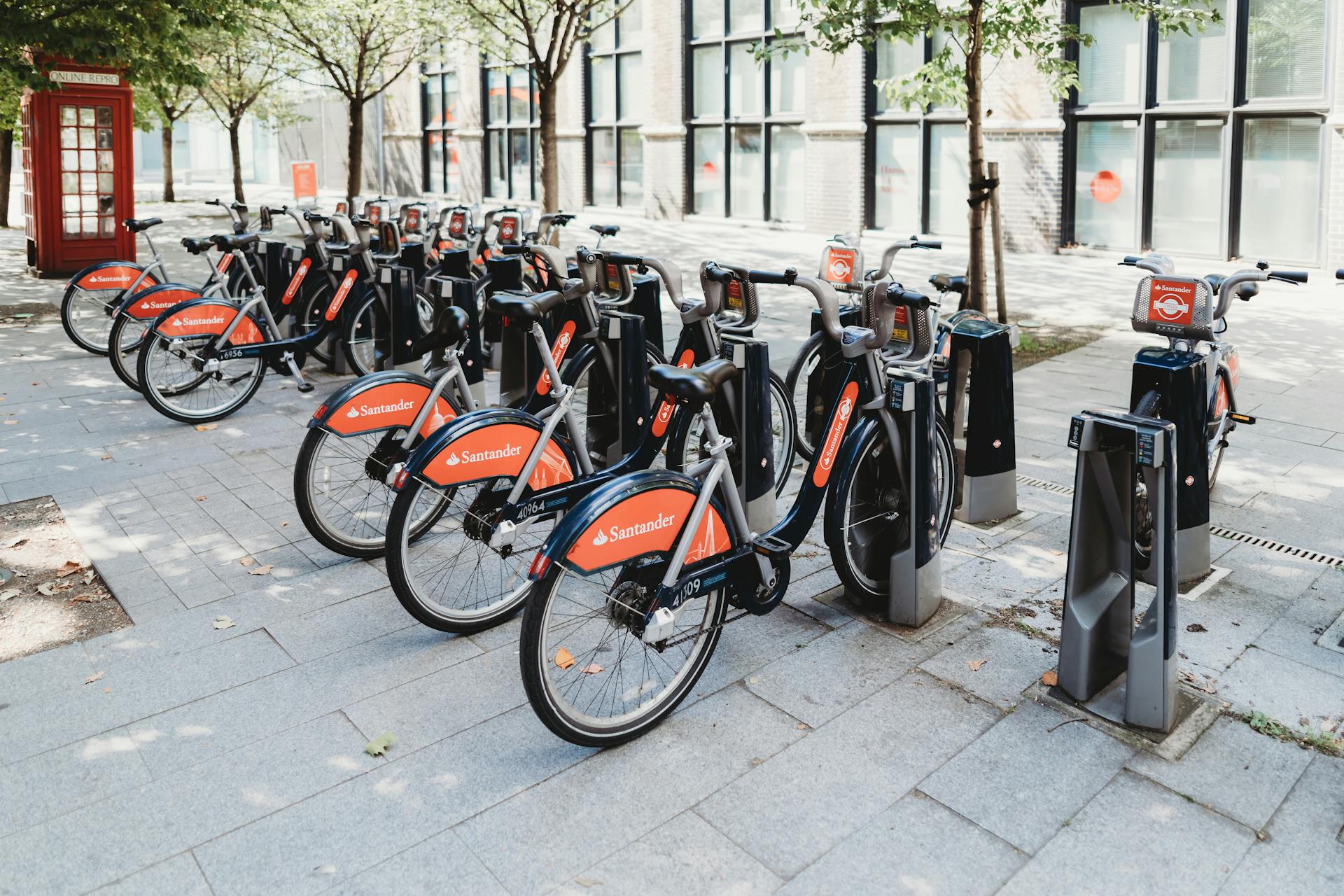 A row of parked Santander bicycles in London offers convenient city travel options.