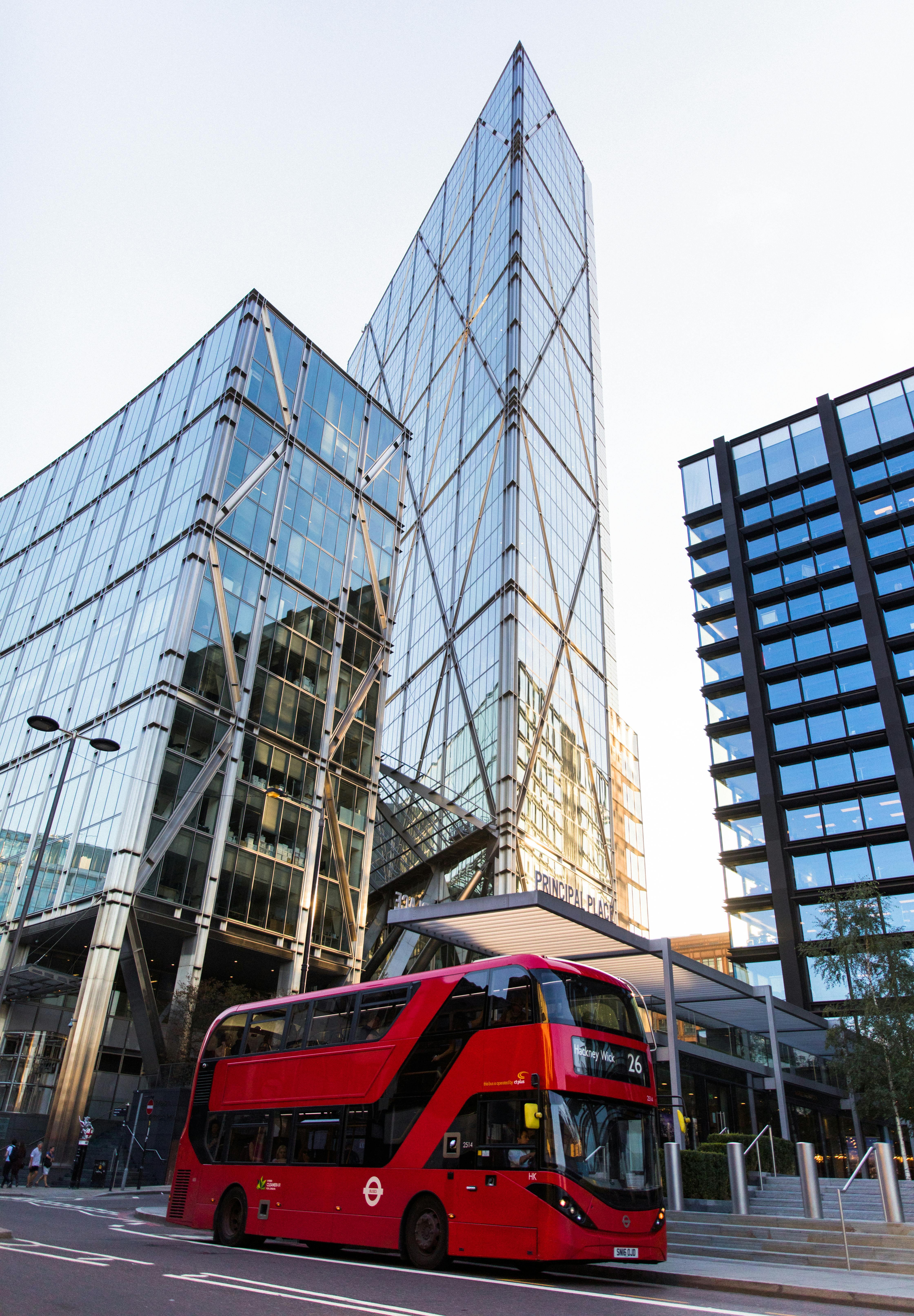 red double decker bus on road