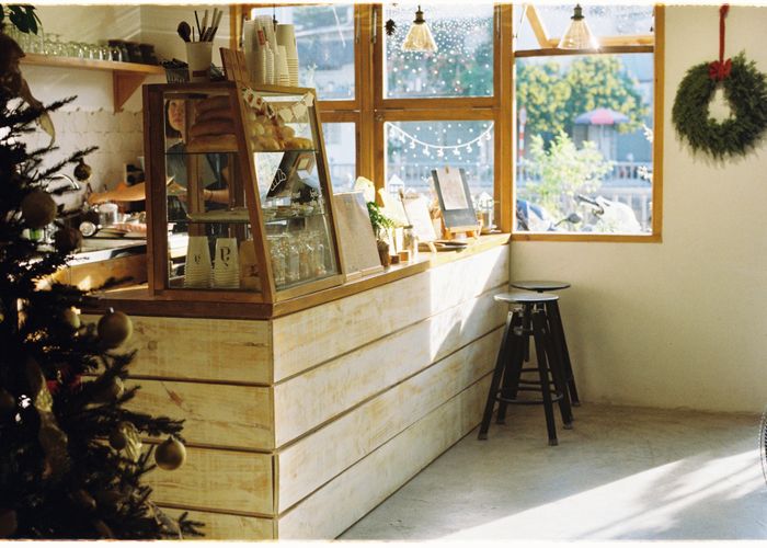 Warm interior of Ramona's Bakery with flour-dusted counters