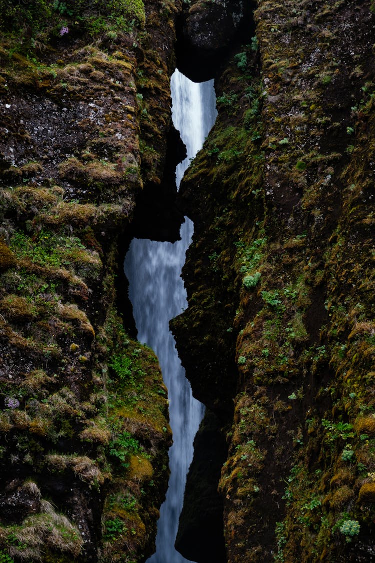 A Waterfall Between Two Rocks