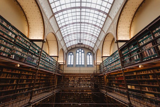 Stunning interior view of a historic library showcasing vast book collections in Amsterdam.