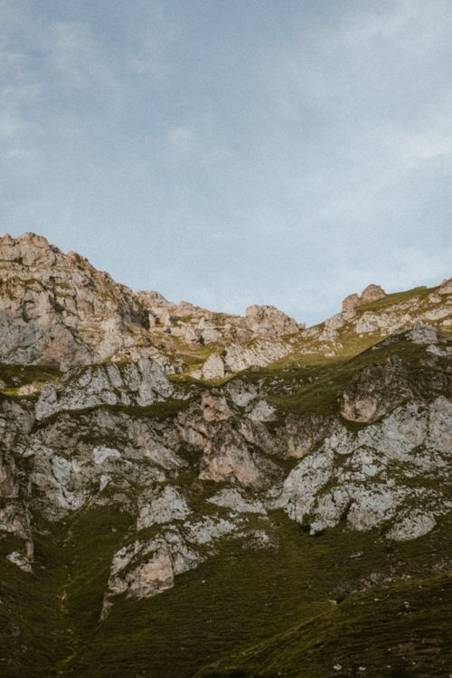 Free Explore the rugged and serene landscapes of Fuente Dé, featuring striking rock formations under a clear sky. Stock Photo