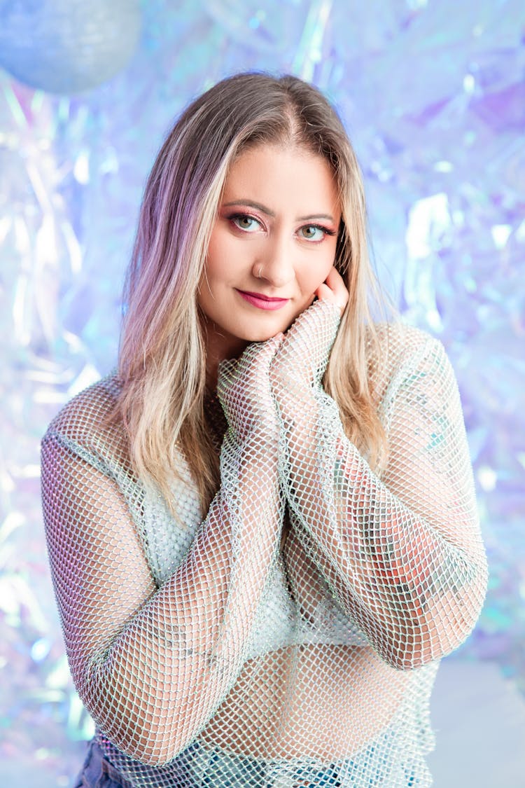 Portrait Of Blonde Woman In Winter Scenery 