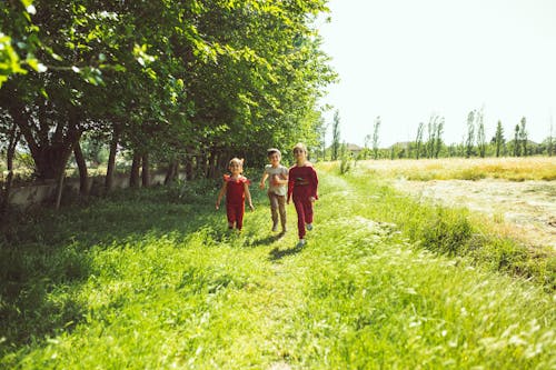 Children Running through a Field 
