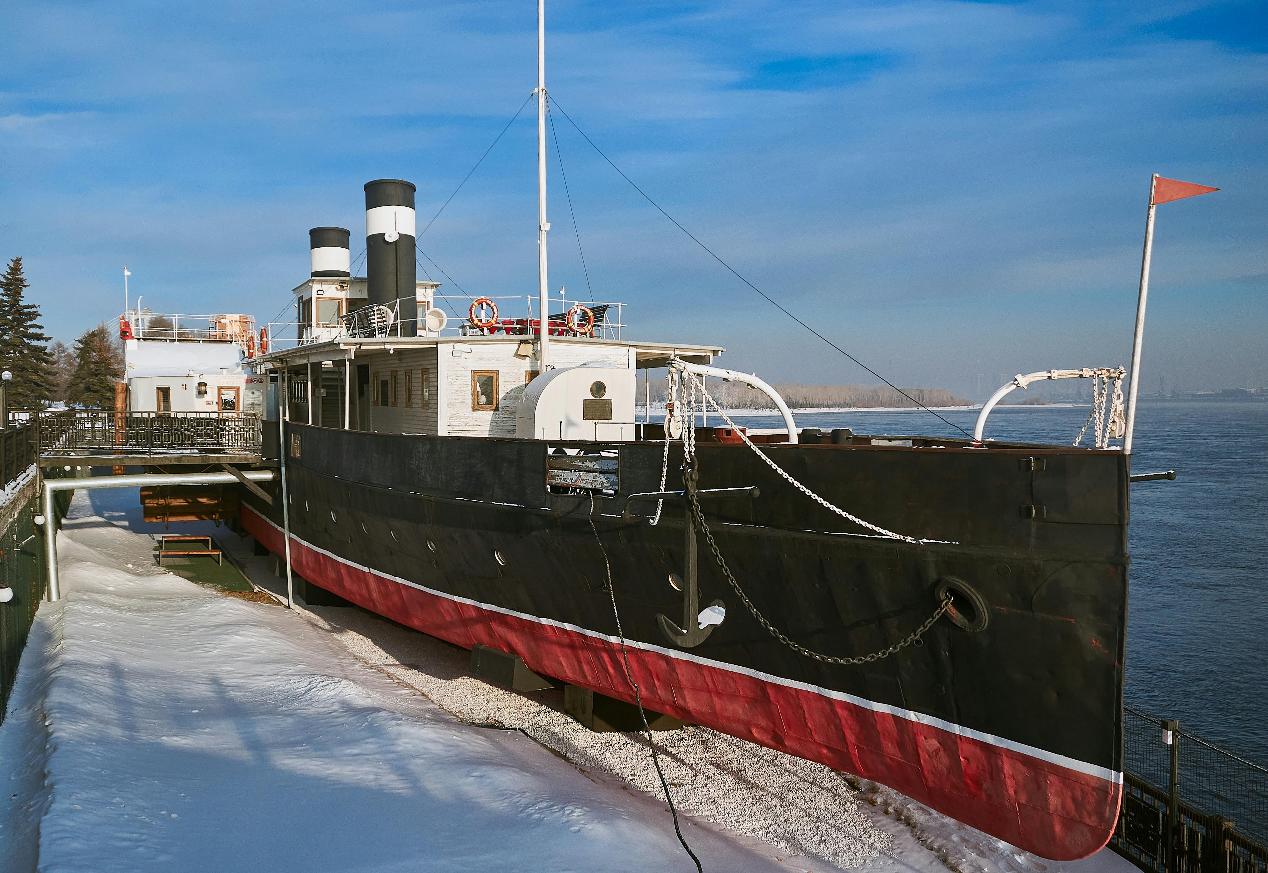 Big Ship by a Harbor