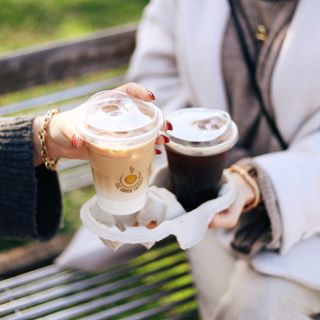 Morning coffee held against the light, photo by Enisa Halidi on Pexels
