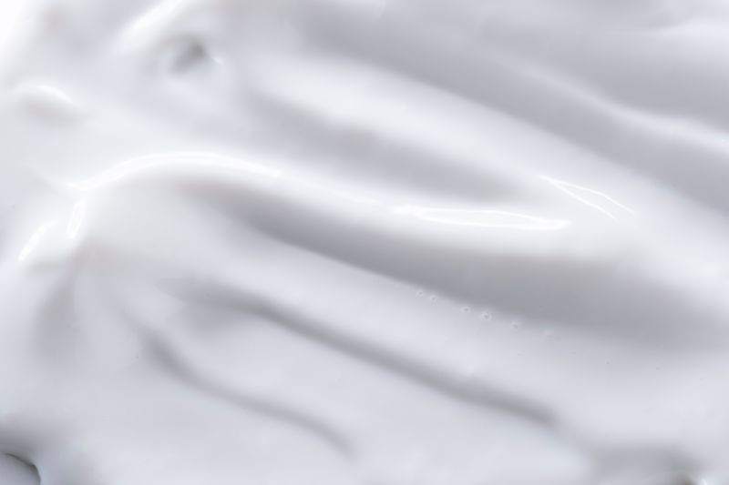 Close-up of smooth milky cream texture