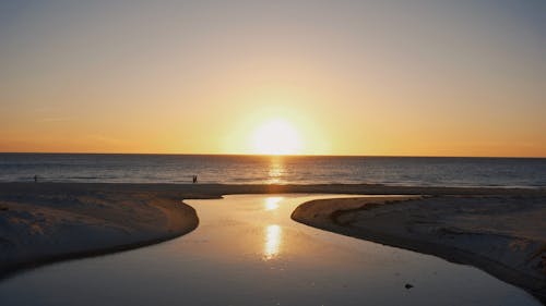 Foto d'estoc gratuïta de posta de sol daurada