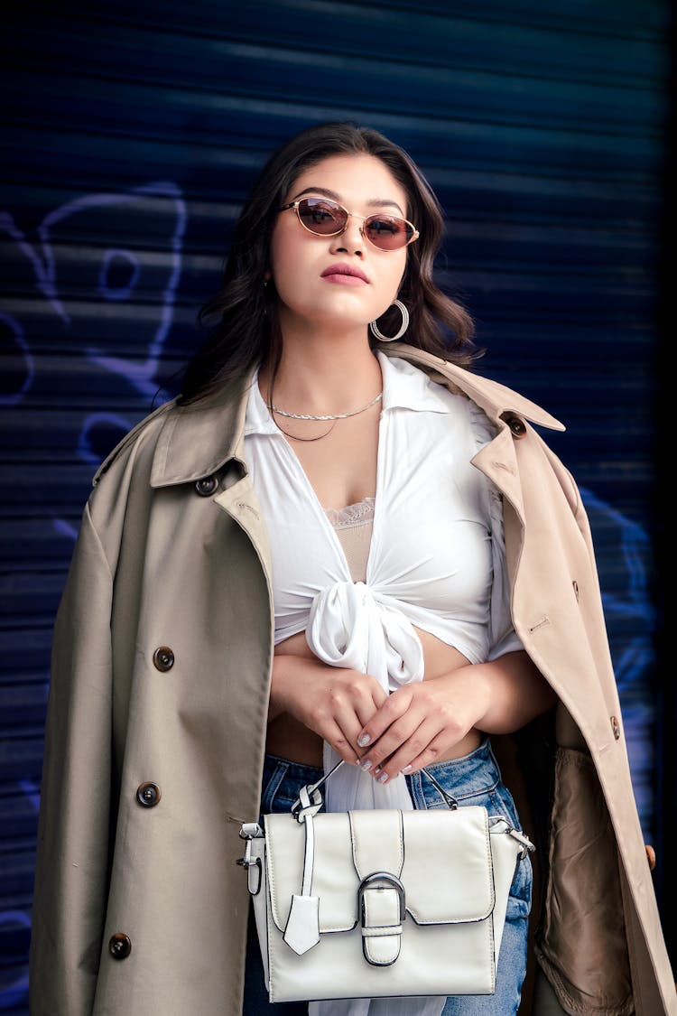 Beautiful Brunette Woman Posing In A Trendy Outfit